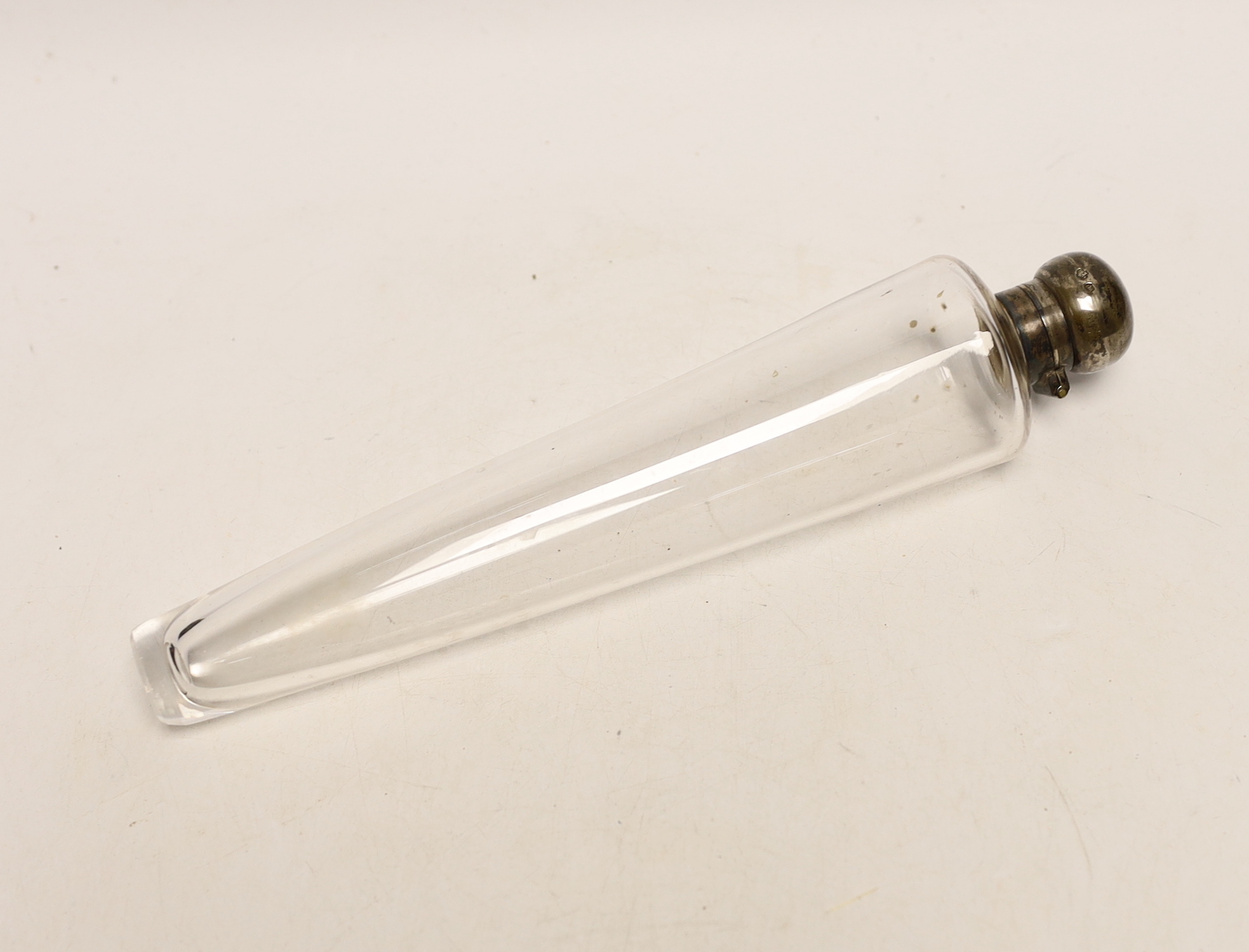 A George V silver mounted glass teardrop shaped scent flask, William Hutton & Sons, Ltd, Sheffield, 1925, 25.9 cm.